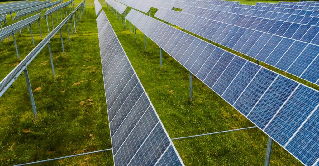 pexels-photo-4320473-4320473 Aerial view of solar panels in a green field, Rossville, GA.